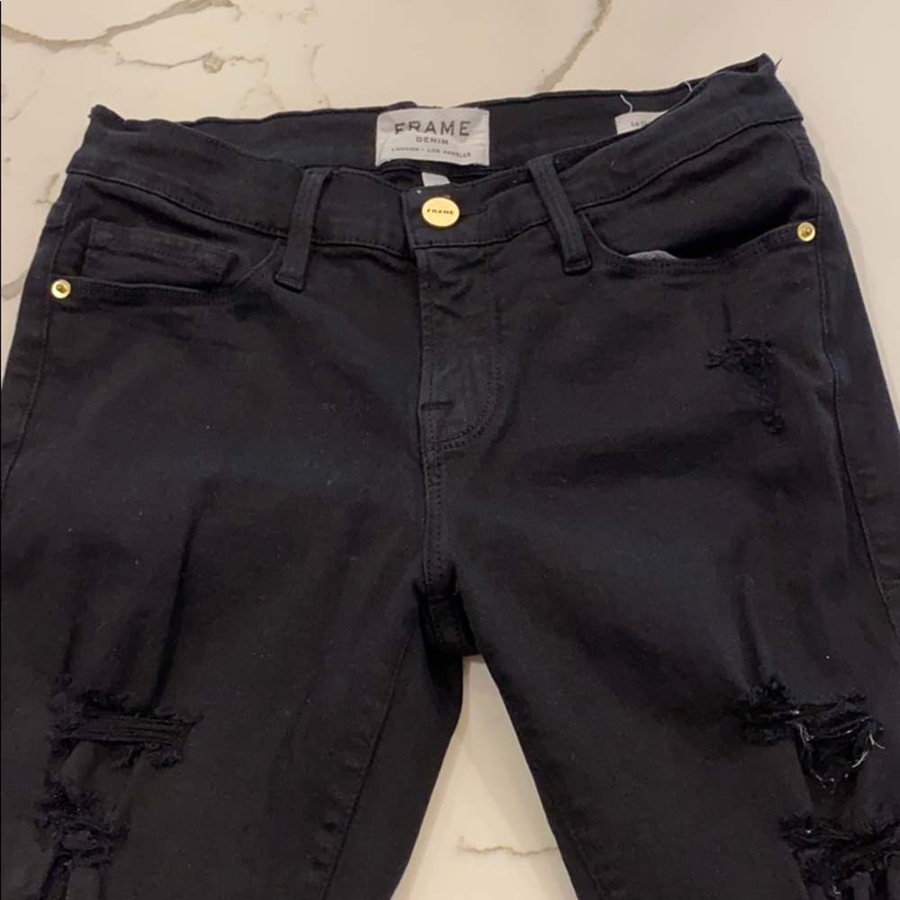 Black frame skinny ripped jeans